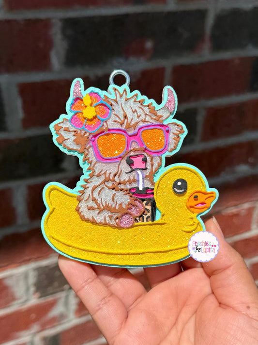 Highland Cow in Floatie